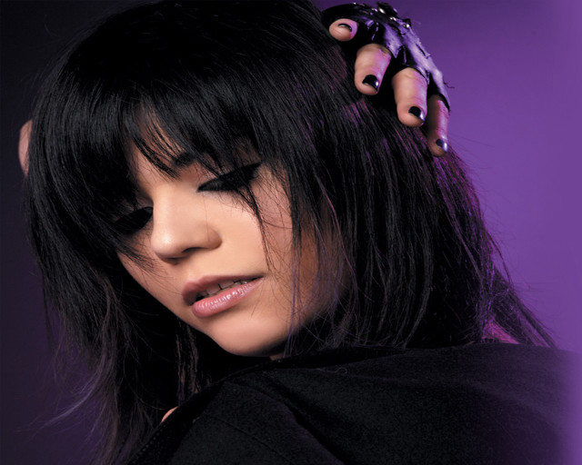 Woman black hair scissors serious free wallpaper for desktop - medium preview image