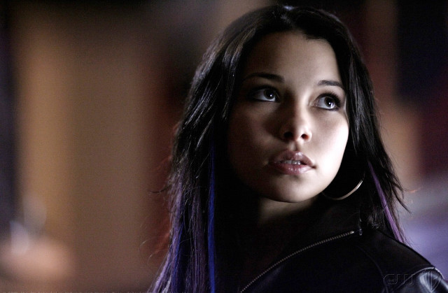 Woman long hair piercings serious free wallpaper for desktop - medium preview image