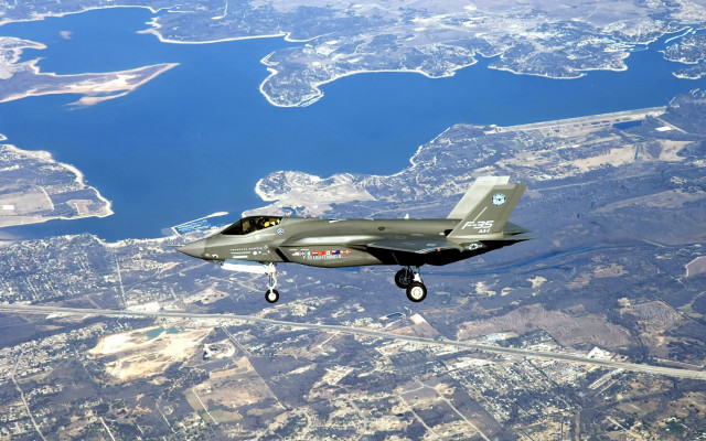 Fighter jet city lake sky free wallpaper for desktop - medium preview image
