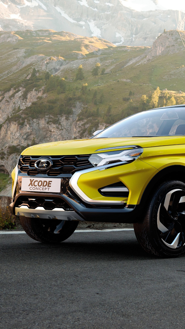 Yellow suv parked road mountain free wallpaper for mobile - medium preview image