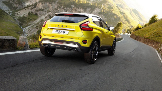 Yellow car driving road mountain free wallpaper for desktop - medium preview image