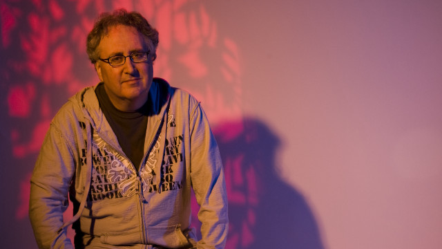 Man hoodie red light shadow free wallpaper for desktop - medium preview image