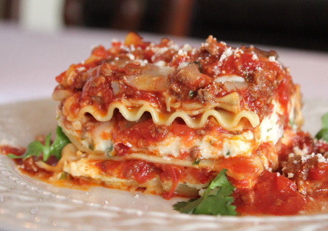 Lasagna plate sauce parsley fork free wallpaper for desktop - medium preview image