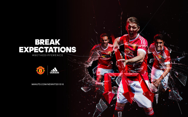 Man red uniform kicking soccer free wallpaper for desktop - medium preview image