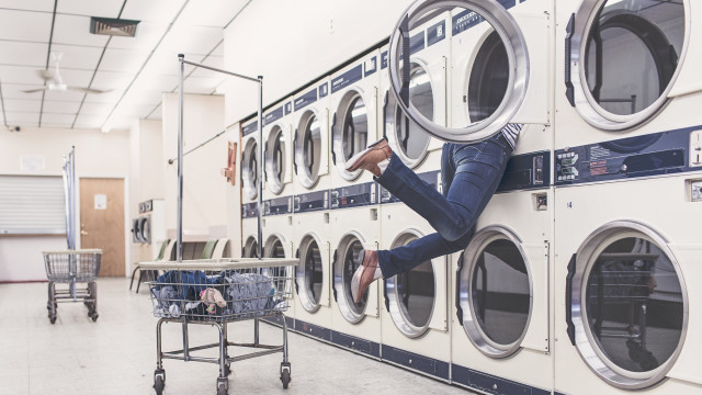 Laundry room man hanging washing free wallpaper for desktop - medium preview image