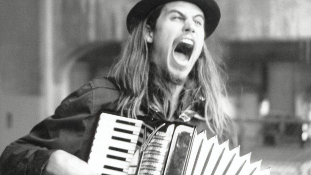 Long haired man hat accordion free wallpaper for desktop - medium preview image