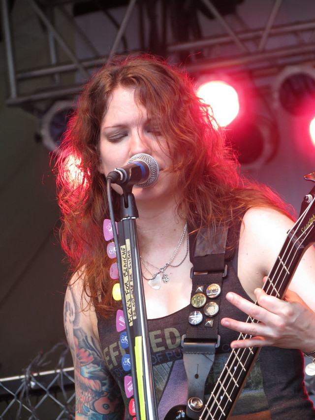 Woman long hair playing guitar #3 free wallpaper for mobile - medium preview image