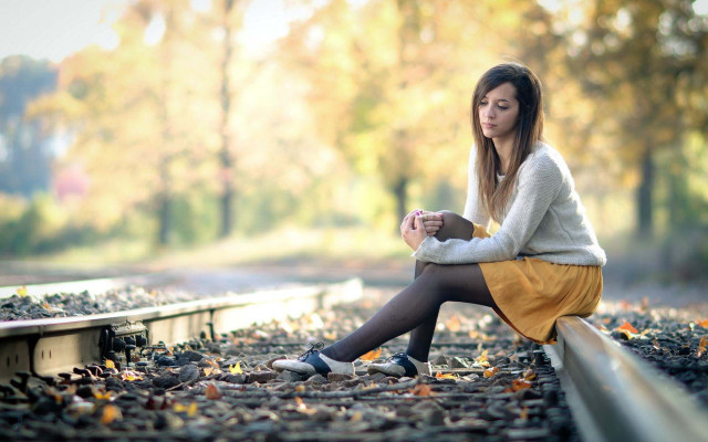 Train track woman autumn blurry free wallpaper for desktop - medium preview image