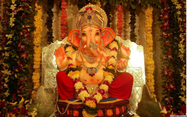 Ganesha statue flowers garland man free wallpaper for desktop - medium preview image