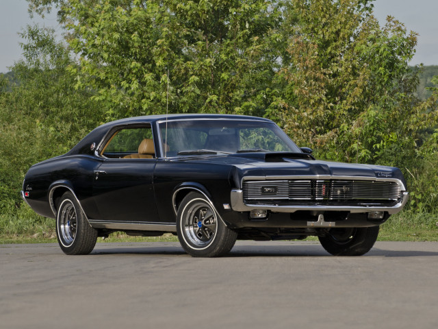 Black muscle car parked street free wallpaper for desktop - medium preview image