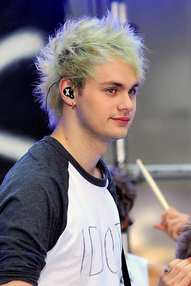 Mohawk earbuds microphone drum man free wallpaper for mobile - medium preview image