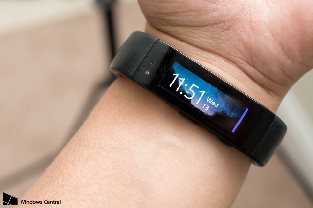 Person holding smartwatch clock screen free wallpaper for desktop - medium preview image