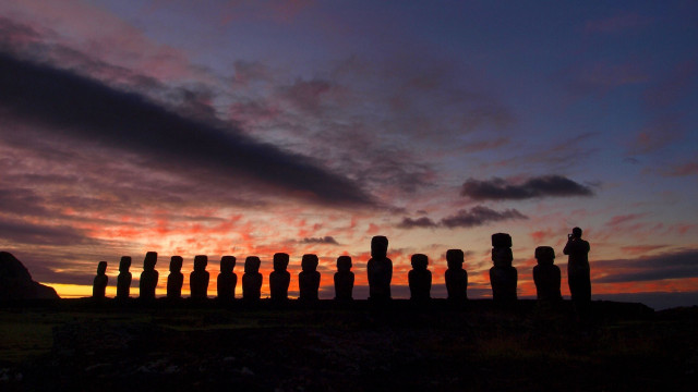 Sunset moai statues field sky free wallpaper for desktop - medium preview image