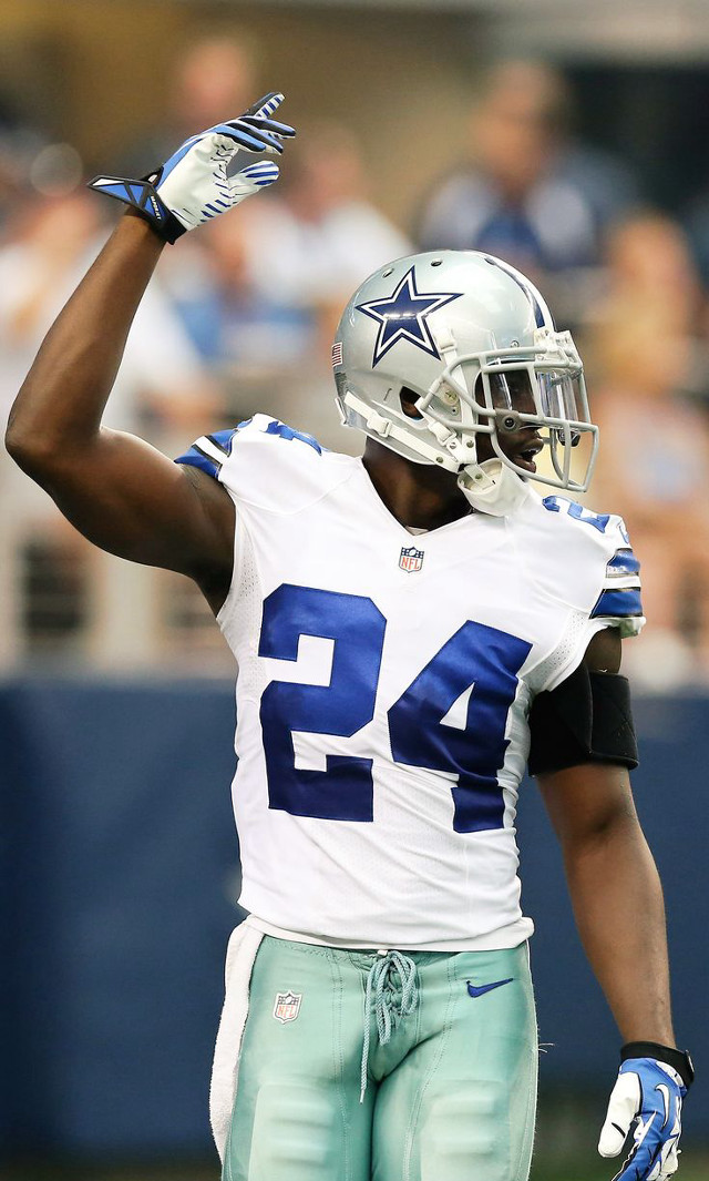 Football player hand up uniform free wallpaper for mobile - medium preview image