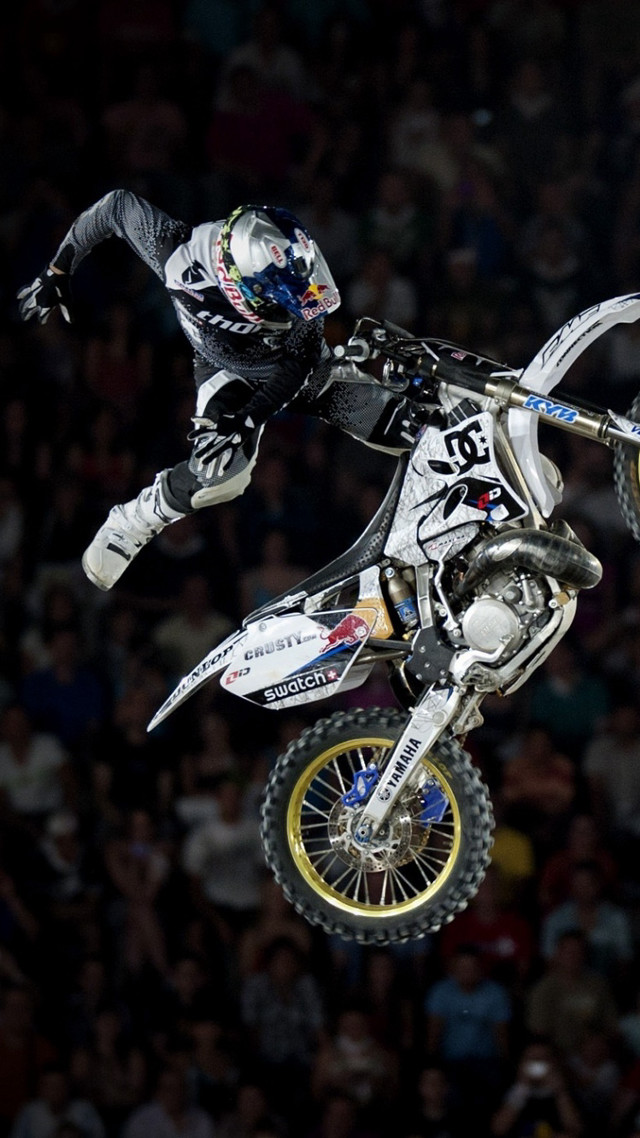 Motorcycle air trick crowd stands free wallpaper for mobile - medium preview image