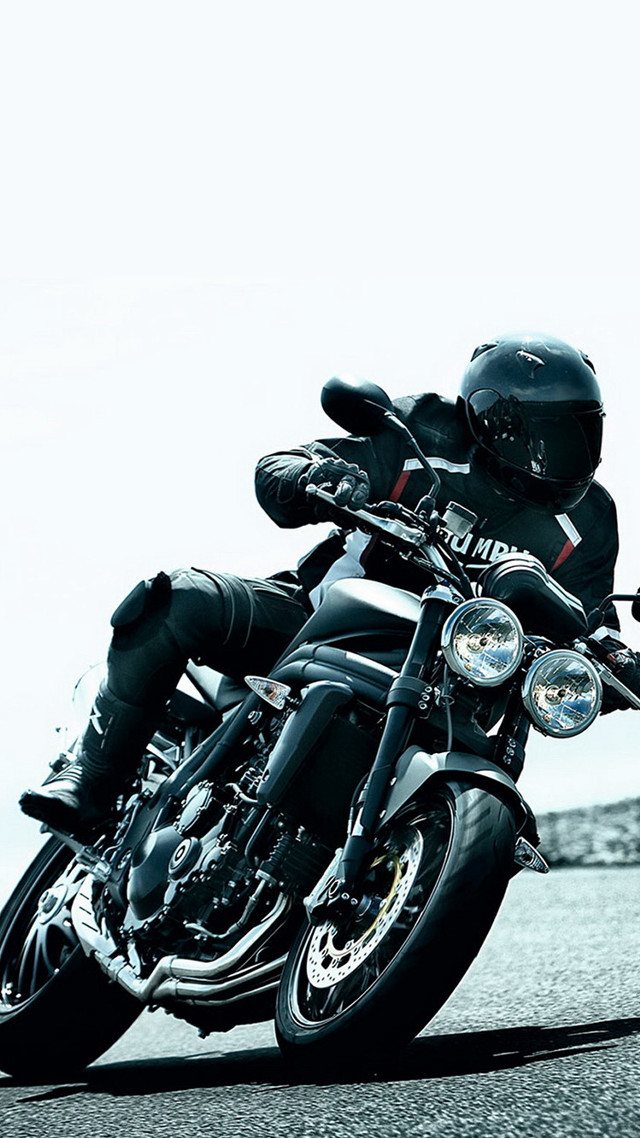 Man motorcycle street rock wall free wallpaper for mobile - medium preview image