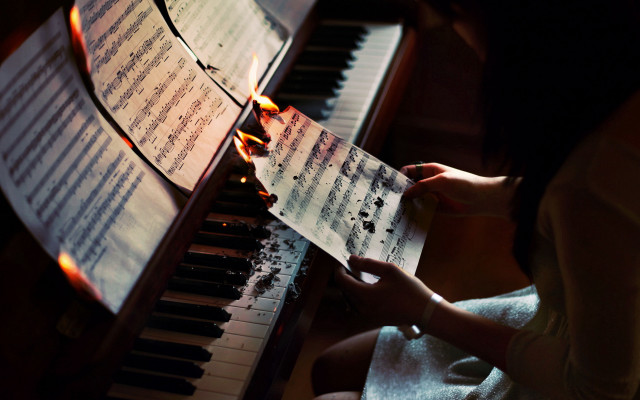 Woman playing piano flames sheet free wallpaper for desktop - medium preview image