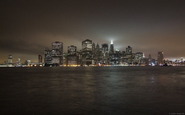 City skyline night foggy water free wallpaper for desktop - medium preview image
