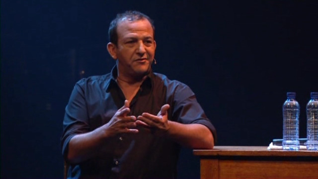 Man standing table bottle water free wallpaper for desktop - medium preview image