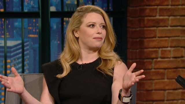 Woman chair hands brick wall free wallpaper for desktop - medium preview image