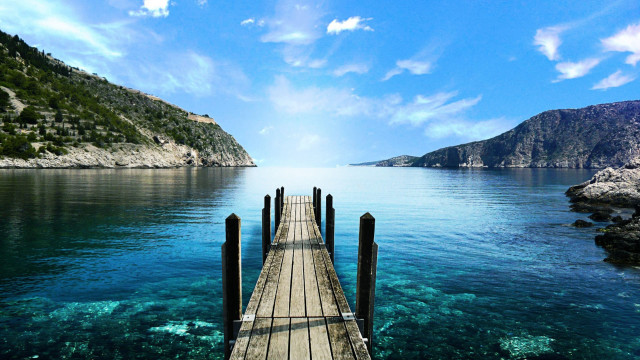Pier ocean mountains blue water free wallpaper for desktop - medium preview image