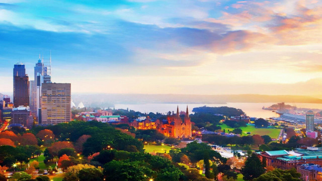 City skyline lake sunset colorful free wallpaper for desktop - medium preview image