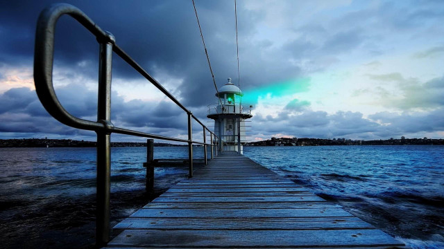 Pier lighthouse night cloudy sky #2 free wallpaper for desktop - medium preview image