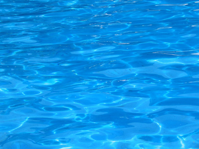 Blue pool white frisbee floating free wallpaper for desktop - medium preview image