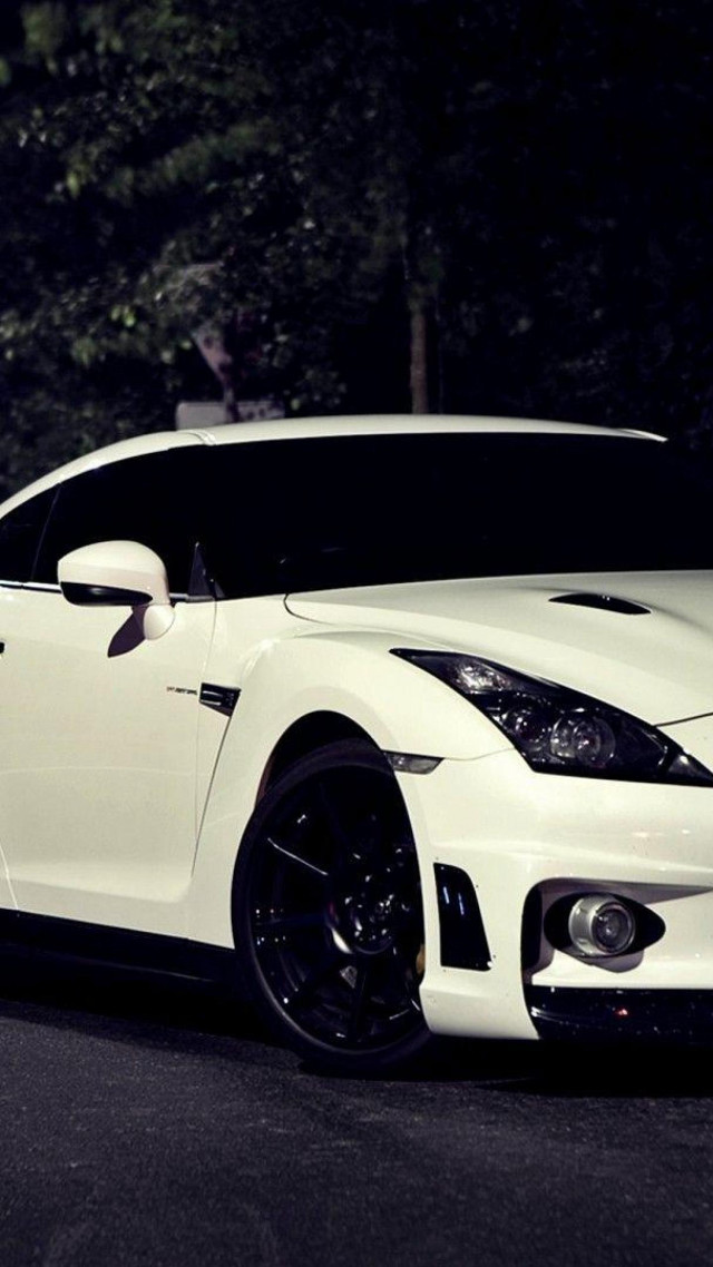 White sports car night trees free wallpaper for mobile - medium preview image