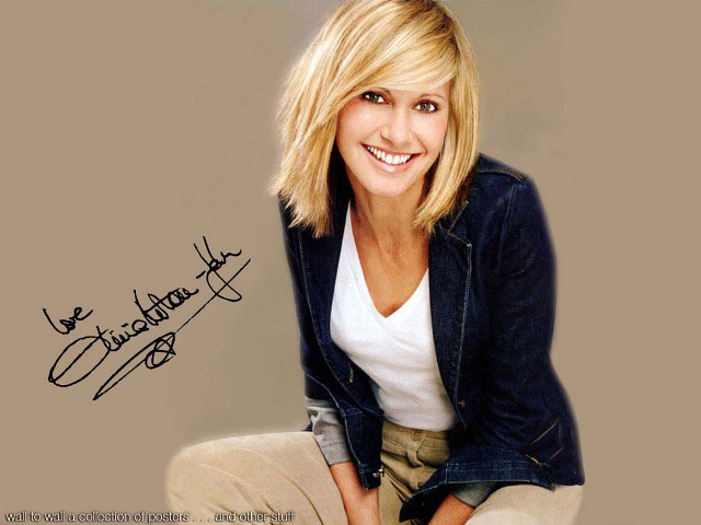 Smiling woman leather jacket blonde free wallpaper for desktop - medium preview image