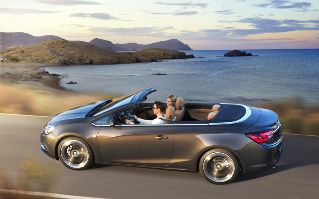 Car driving ocean road people free wallpaper for desktop - medium preview image