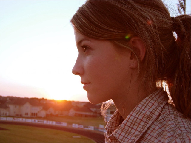 Woman ponytail sunset field houses free wallpaper for desktop - medium preview image