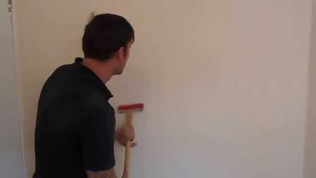 Man holding paint roller wall free wallpaper for desktop - medium preview image