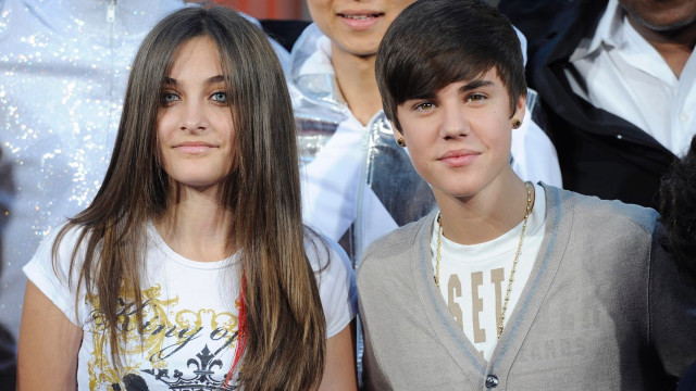 Two young boys standing crowd free wallpaper for desktop - medium preview image