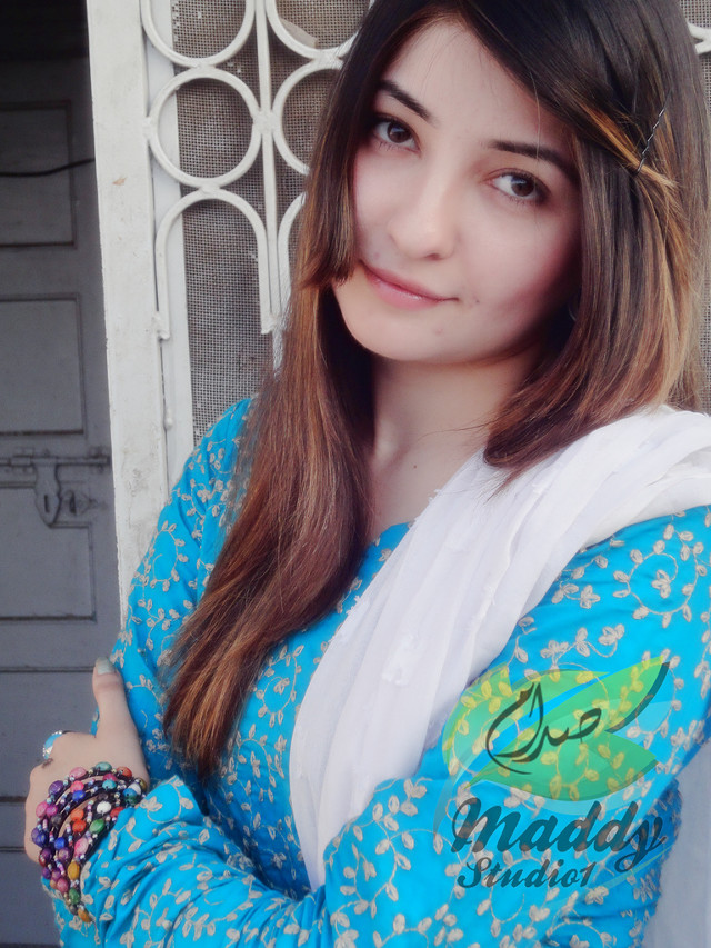 Woman longhair bluejacket whiteshirt hurufiyya free wallpaper for mobile - medium preview image