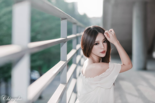 Woman balcony bangs browneyes whitedress free wallpaper for desktop - medium preview image