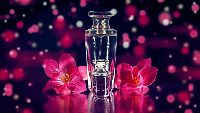 Perfume bottle pink flowers table free wallpaper for desktop - medium preview image