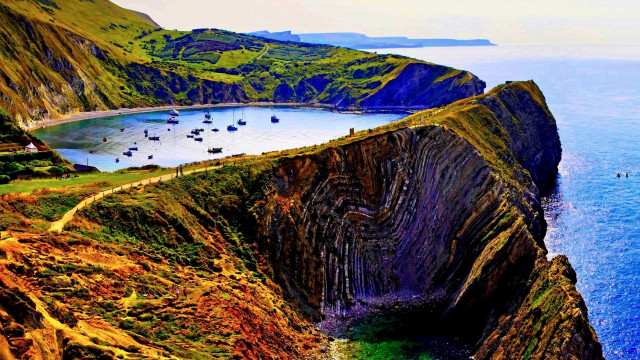 Cliff water boat scenery nature free wallpaper for desktop - medium preview image