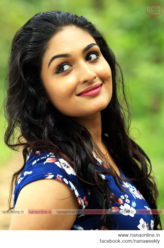 Woman blue dress smiling outdoors free wallpaper for mobile - medium preview image