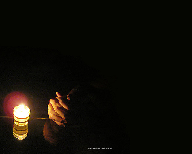 Person holding lit candle dark #2 free wallpaper for desktop - medium preview image