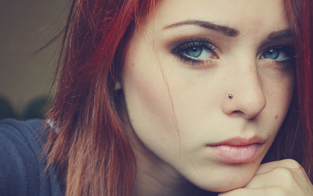 Redhair woman nosepiercing seriouslook blueeyes free wallpaper for desktop - medium preview image