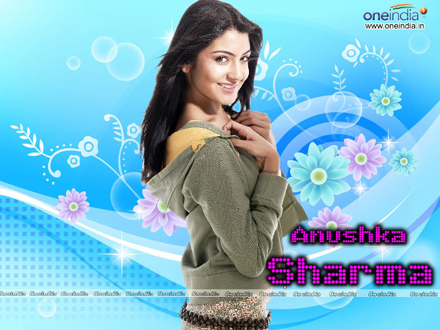 Woman smiling green shirt flower free wallpaper for desktop - medium preview image