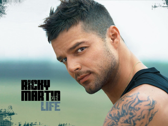 Man tattoo serious look camera free wallpaper for desktop - medium preview image