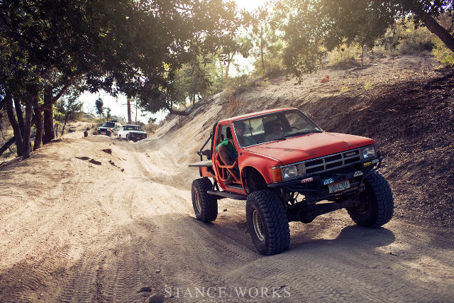 Red truck dirt road forest #2 free wallpaper for desktop - medium preview image