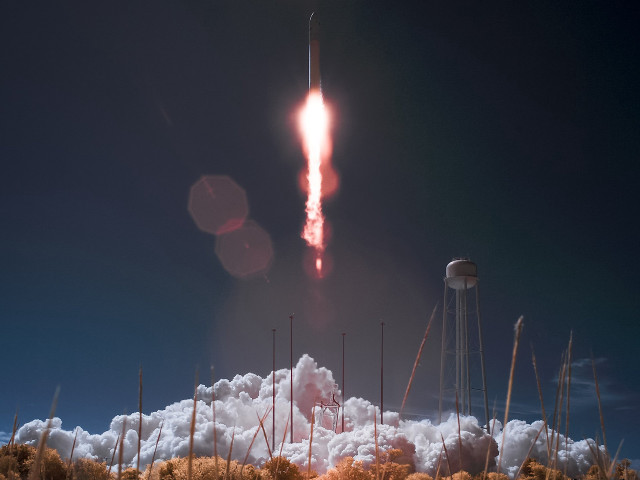 Rocket flying smoke tower background free wallpaper for desktop - medium preview image