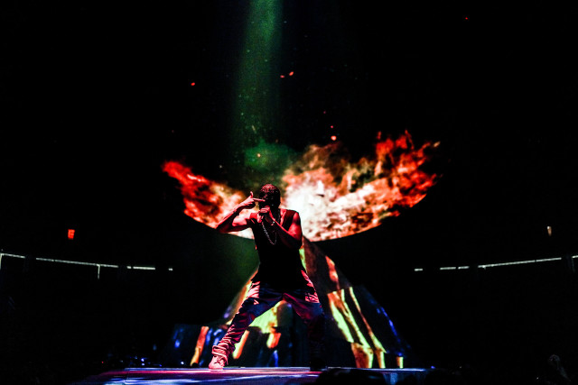 Man stage microphone fireball background free wallpaper for desktop - medium preview image