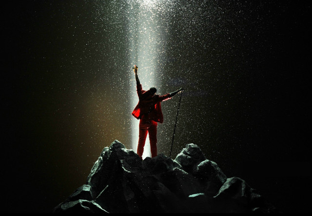 Person mountain light beam arms free wallpaper for desktop - medium preview image