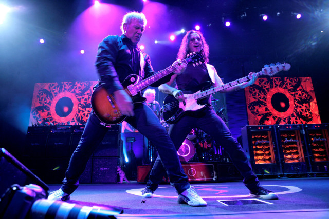 Concert guitarists bright lights night free wallpaper for desktop - medium preview image