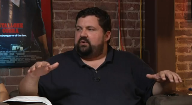 Man sitting chair hands brick free wallpaper for desktop - medium preview image