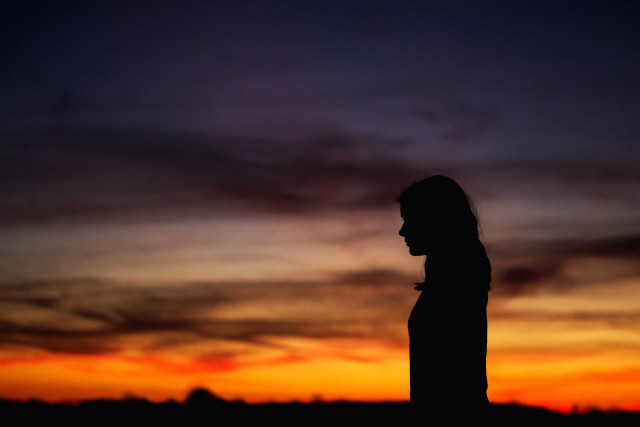 Person sunset cellphone hand silhouette free wallpaper for desktop - medium preview image